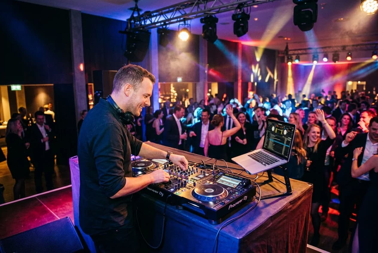 DJ performing at a corporate event in Munich with professional sound and lighting